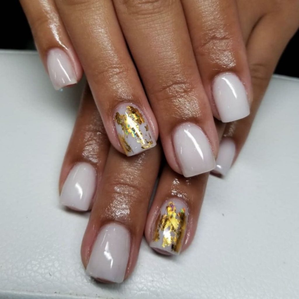 Elevating Elegance: Milky White Nails on Dark Skin - A Fresh Take on Classic Chic