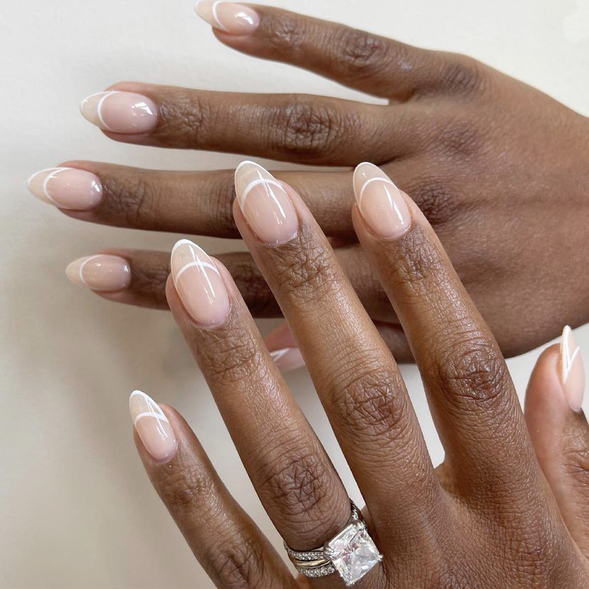 Classy & Stylish: How to Flaunt Pink Almond Nails on Dark Skin