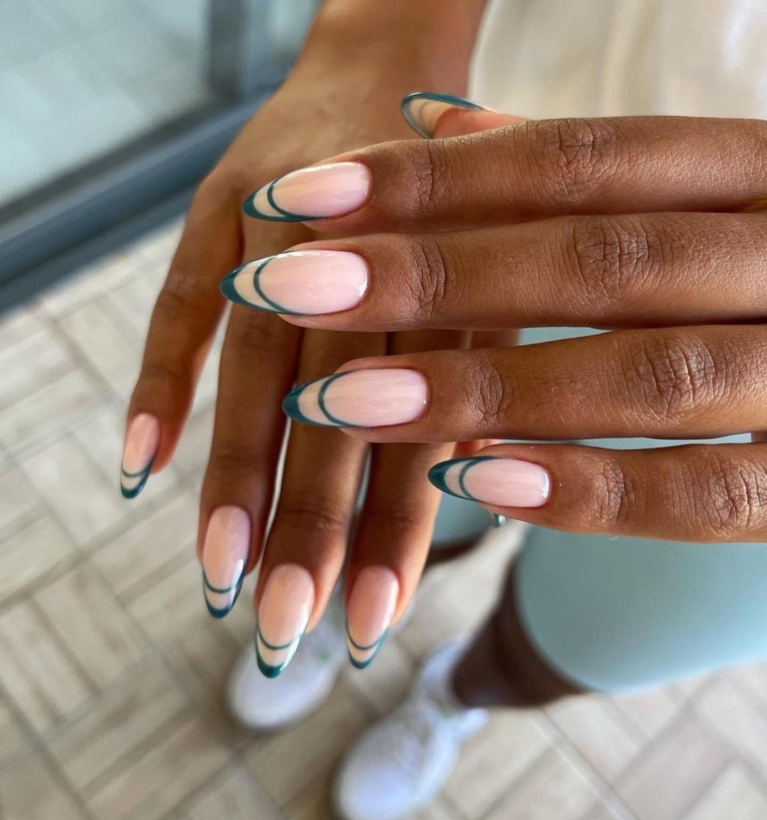 Classy & Stylish: How to Flaunt Pink Almond Nails on Dark Skin