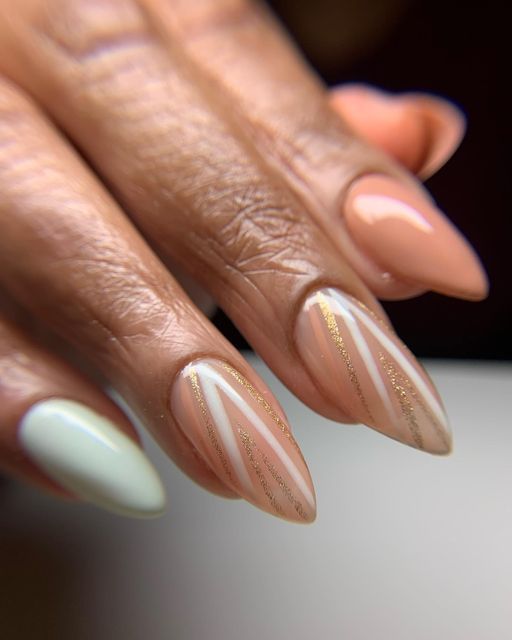 Classy & Stylish: How to Flaunt Pink Almond Nails on Dark Skin