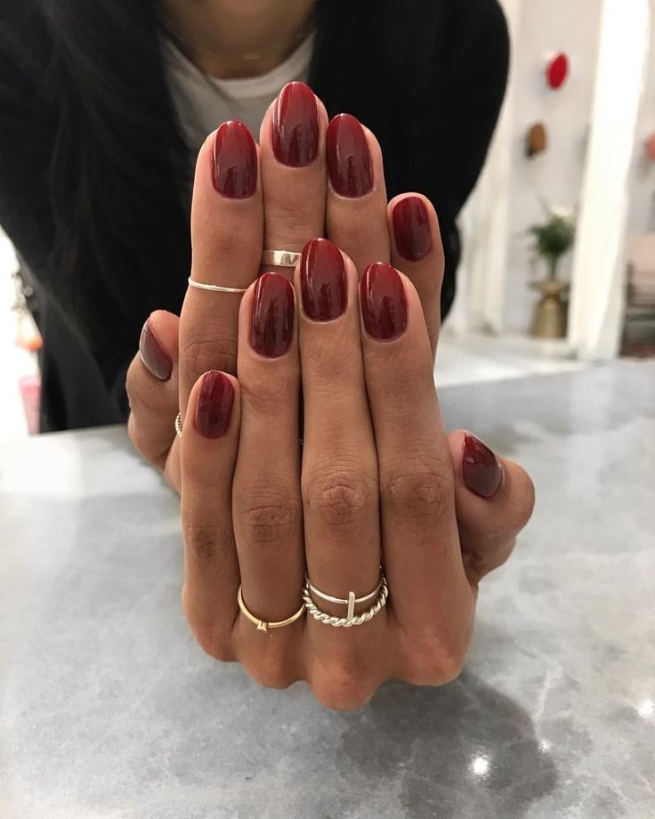 Simple and Classy: Classic Short Red Nails for Dark Skinned Women