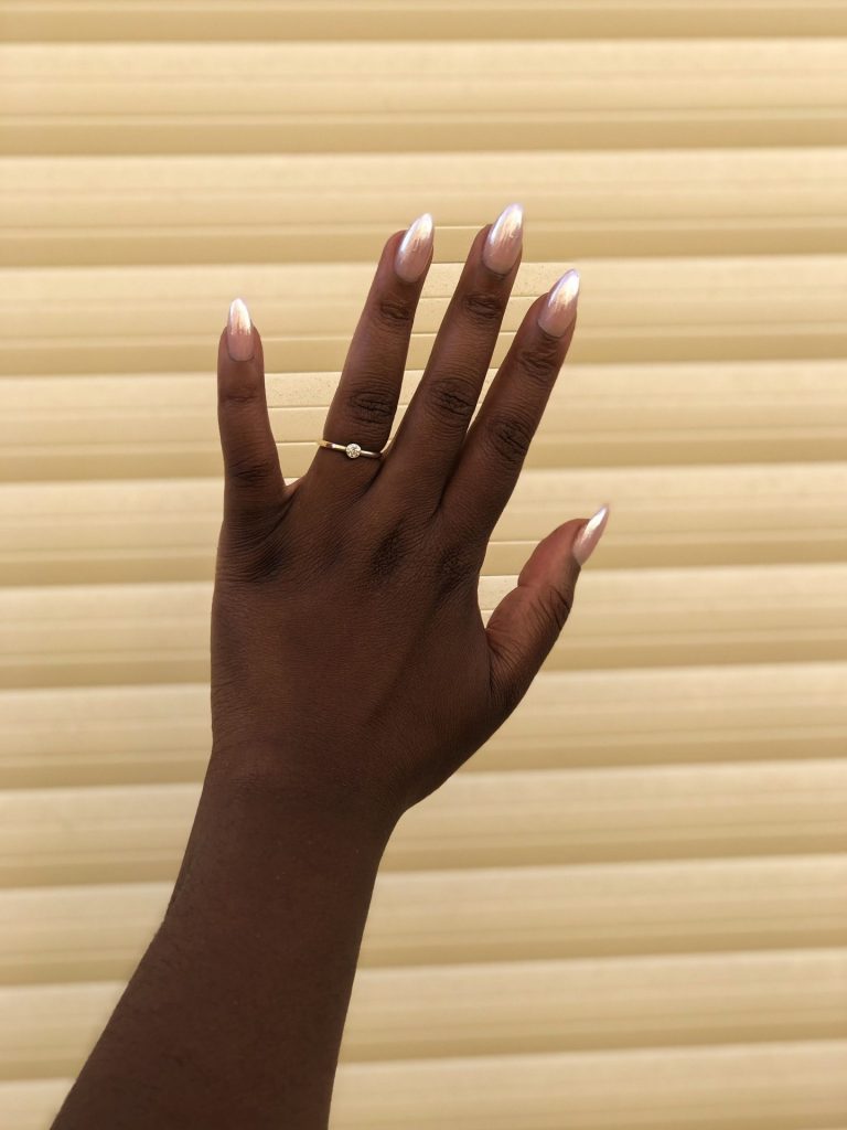 Classy & Stylish: How to Flaunt Pink Almond Nails on Dark Skin