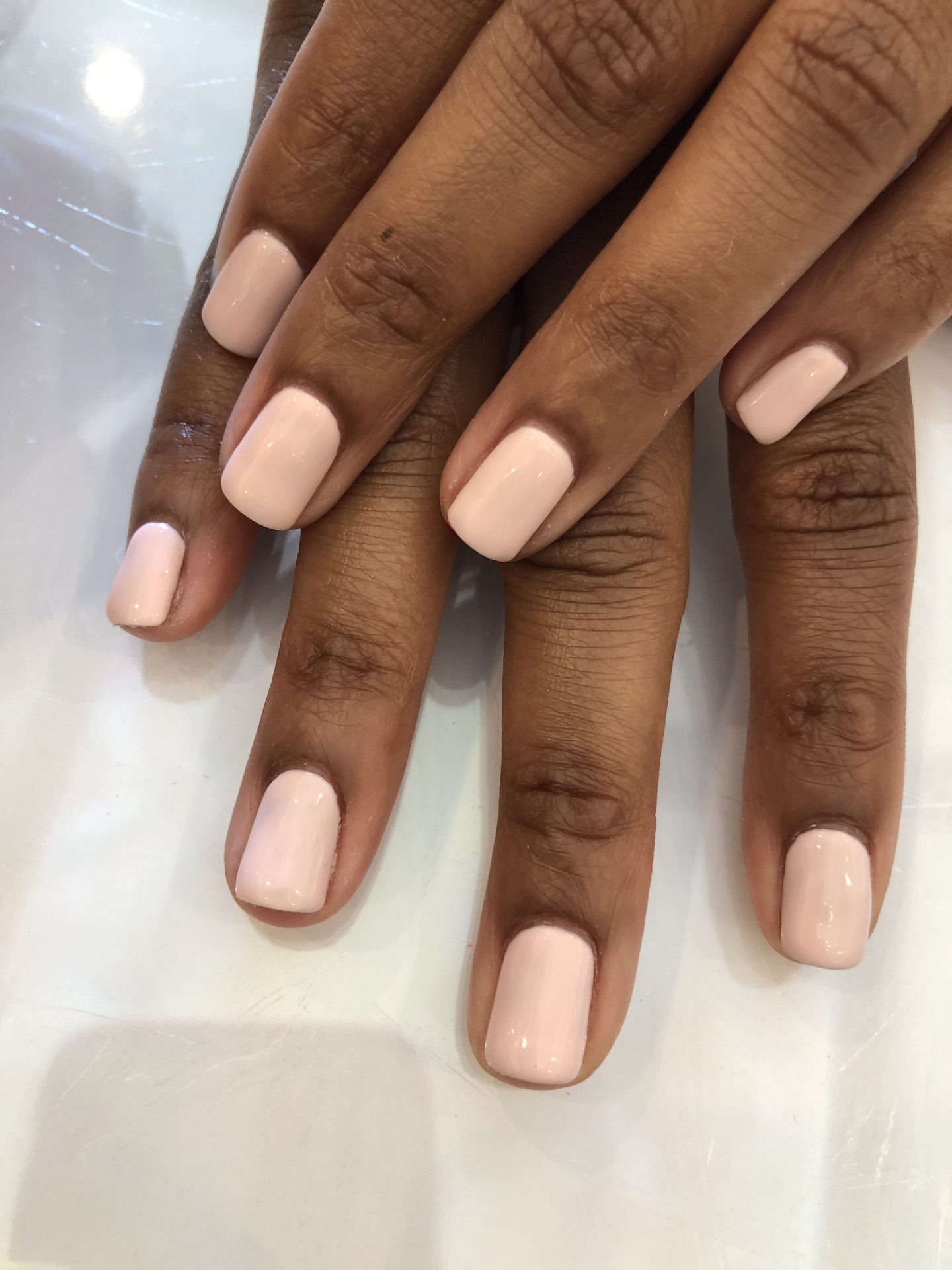 Elegant and Simple Pastel Pink Short Nail Designs for Dark Skin