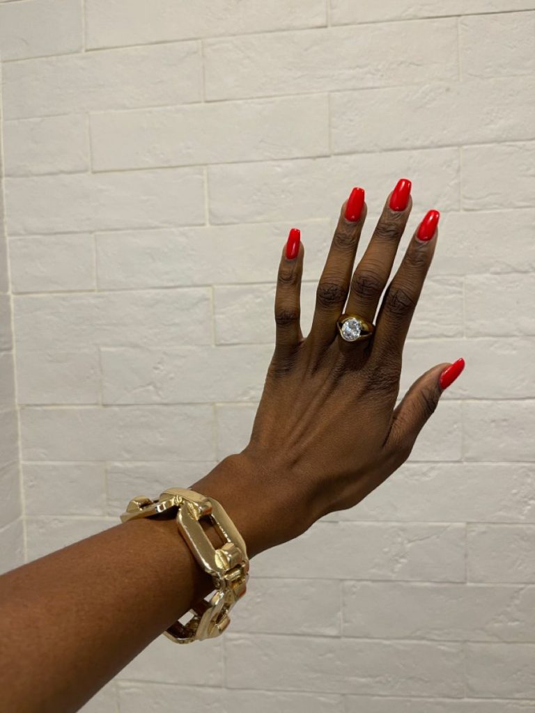 Simple and Classy: Classic Short Red Nails for Dark Skinned Women