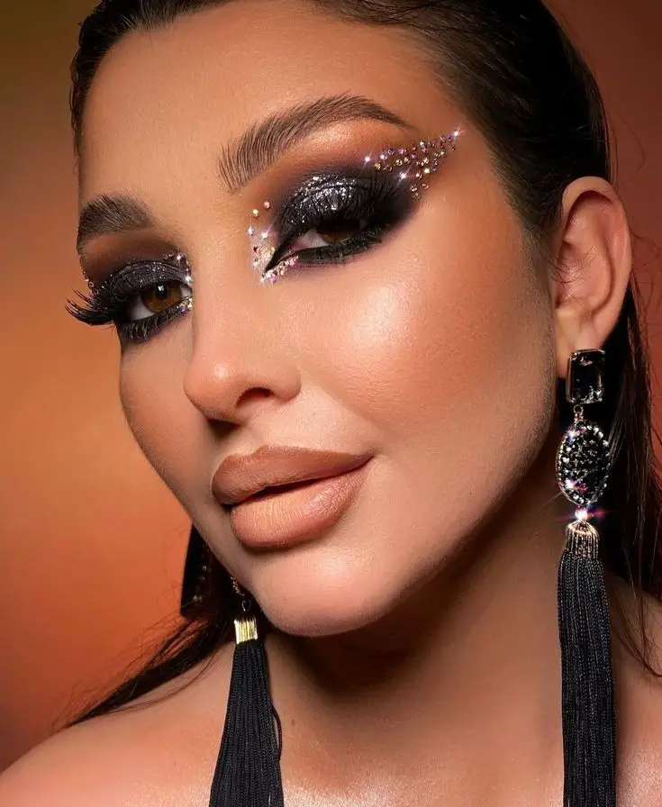 Glam Up 2024 with New Year's Eye Makeup Ideas Glitter, Lunar, and