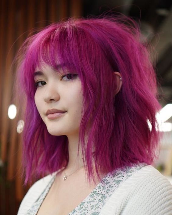 Spring 2024's Bold Hair Colors: Embrace Vivid Reds, Blues, and Pastels