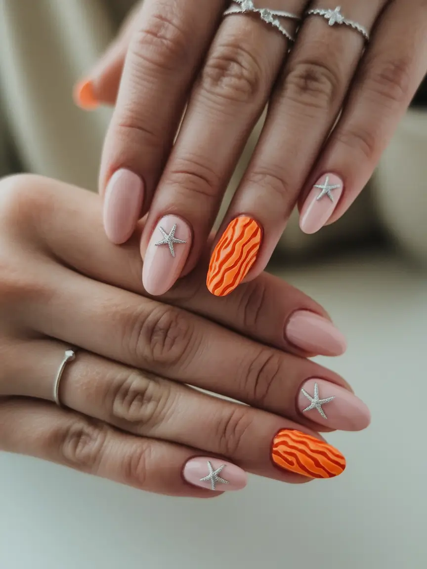 beach nails ideas 2025 Coral Starfish Texture and Nude Base