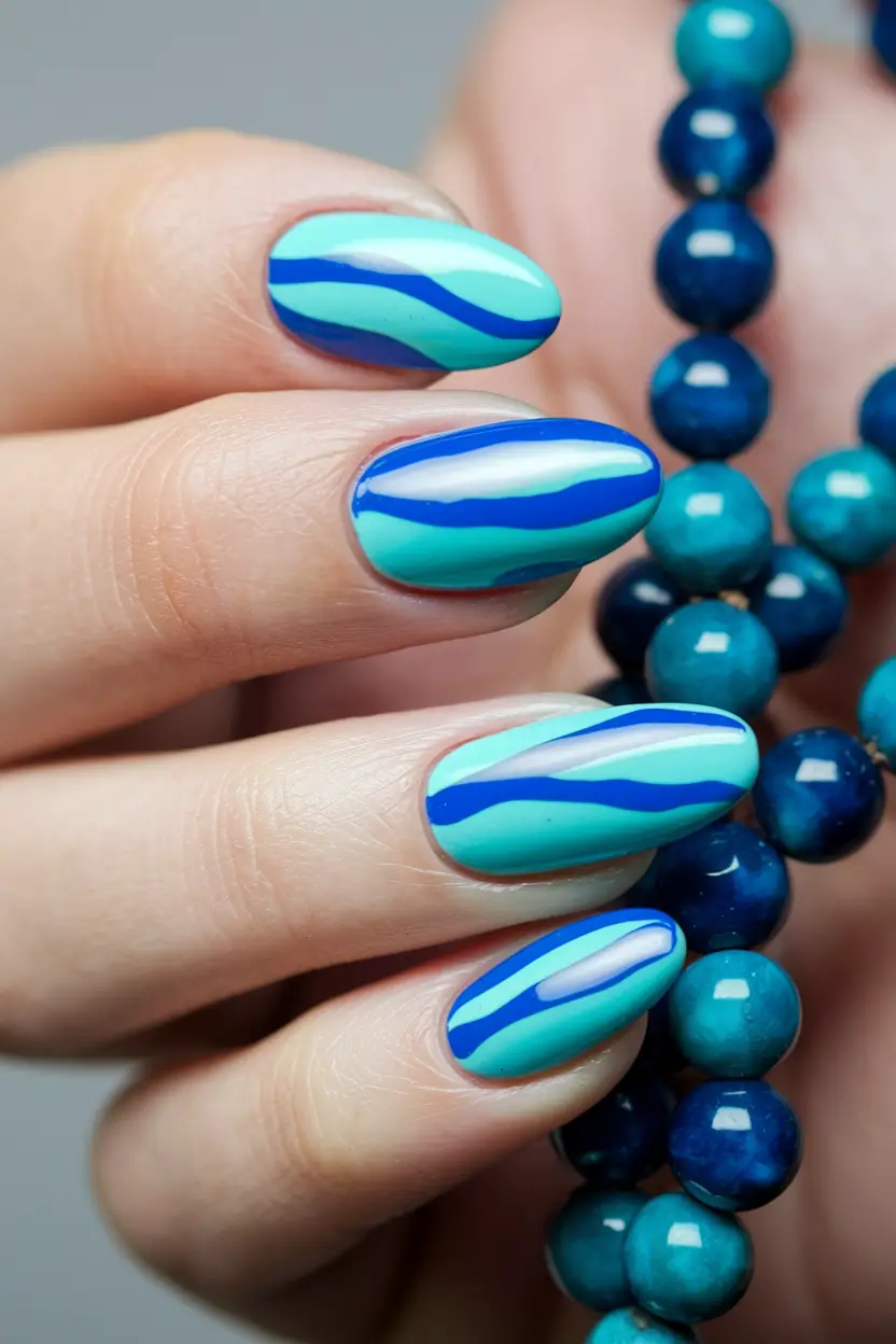 blue nails summer design Turquoise Tides and Midnight Waves