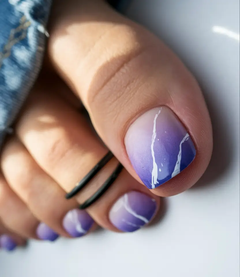 june toe nails ideas 2025 Violet Marble Fade