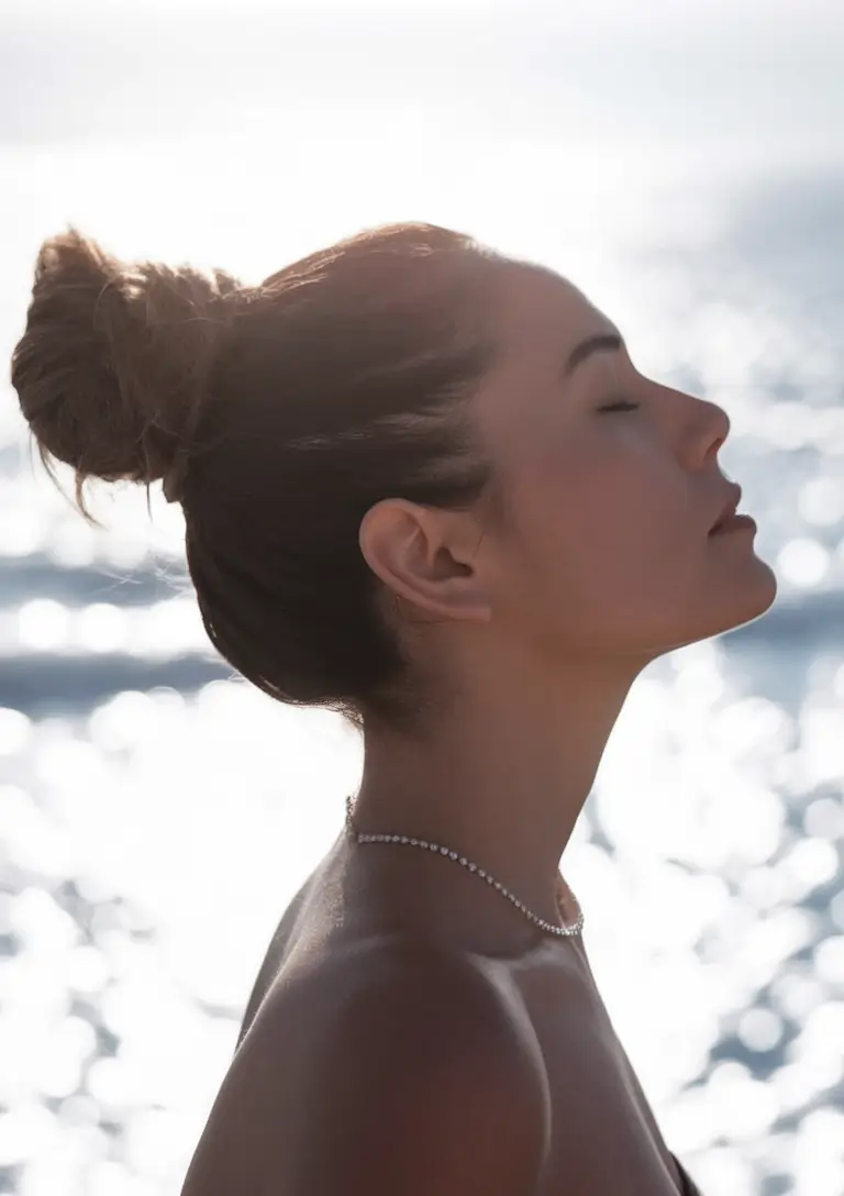 Stay Stylish: Swimming Hairstyles for Summer 2025 Serene High Knot with Soft Volume