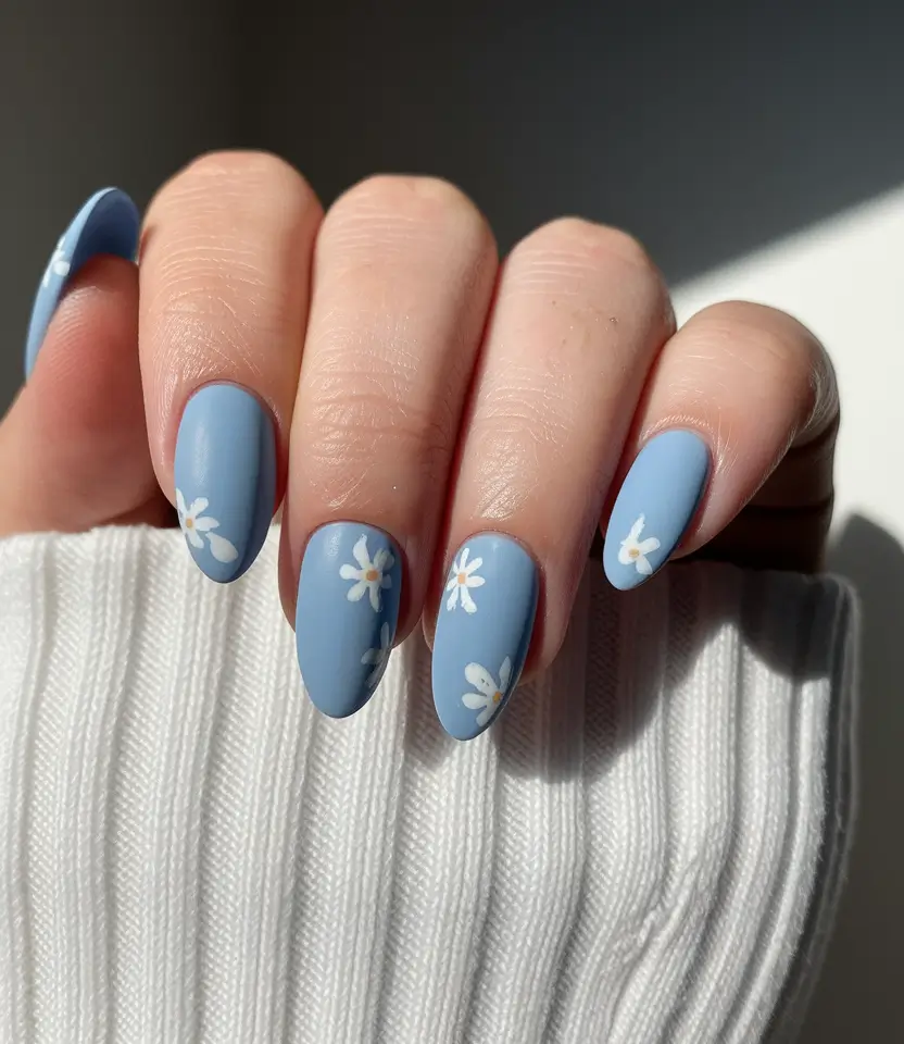 August nails design - summer trends for 2025 Daisy-Sky Almond Whimsy