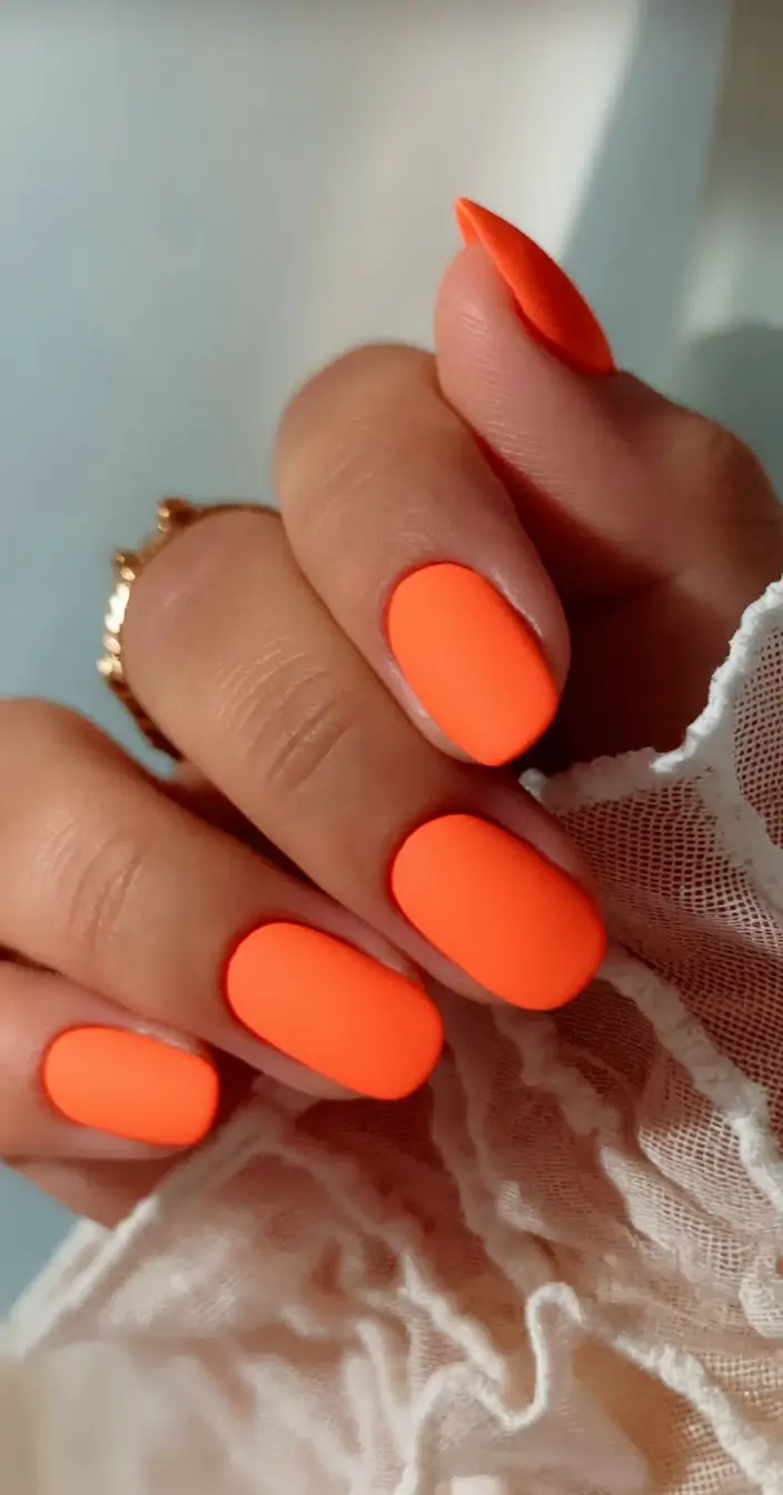 August nails design - summer trends for 2025 Sunset Matte Tangerine
