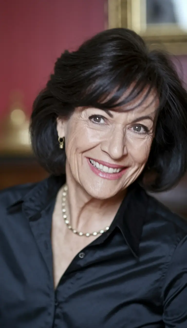 Elegant Fall 2025 Haircut Inspiration for Women Over 60 Classic Chin-Length Bob with Bangs
