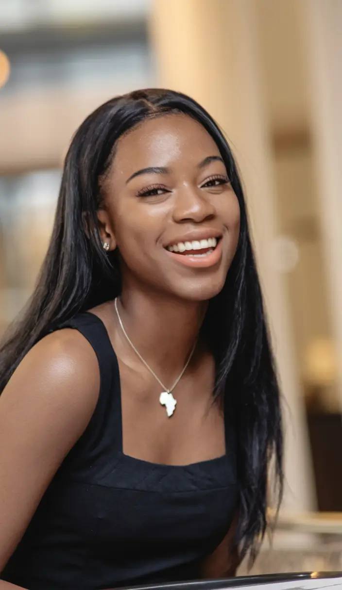 fall hairstyle black women Silk Press Shine with a Center Part