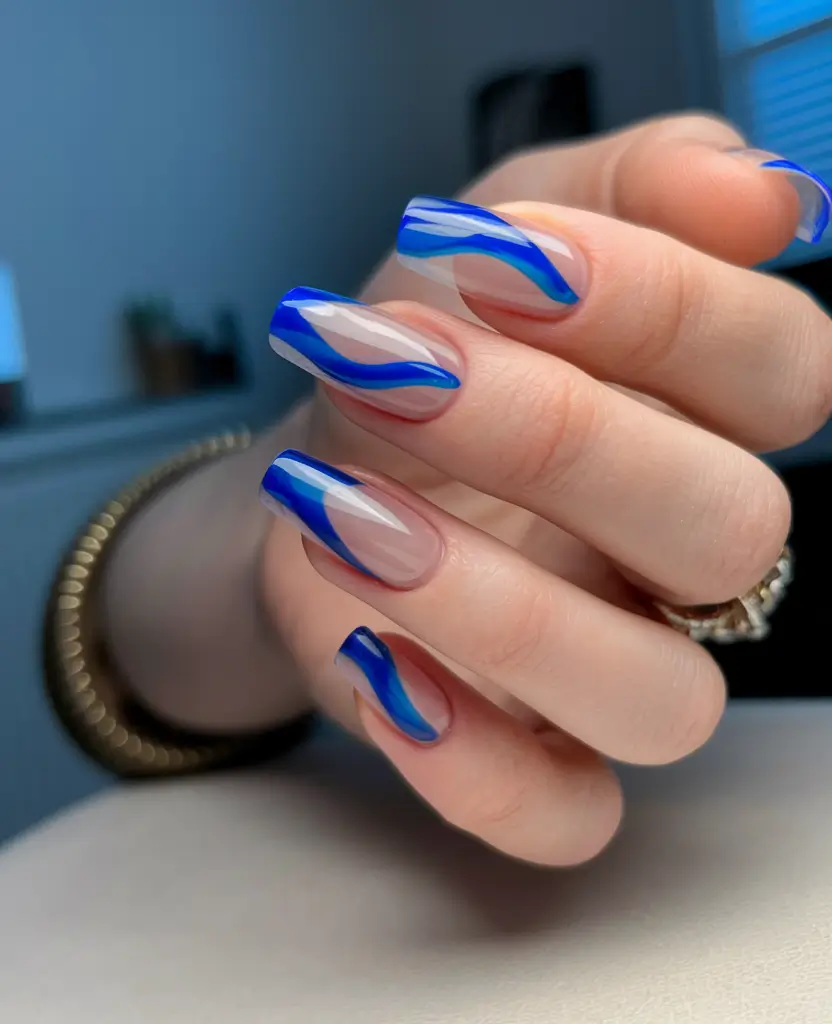 Fall 2025 Nail Color Ideas for 40+ Women Modern Blue Swirl Art
