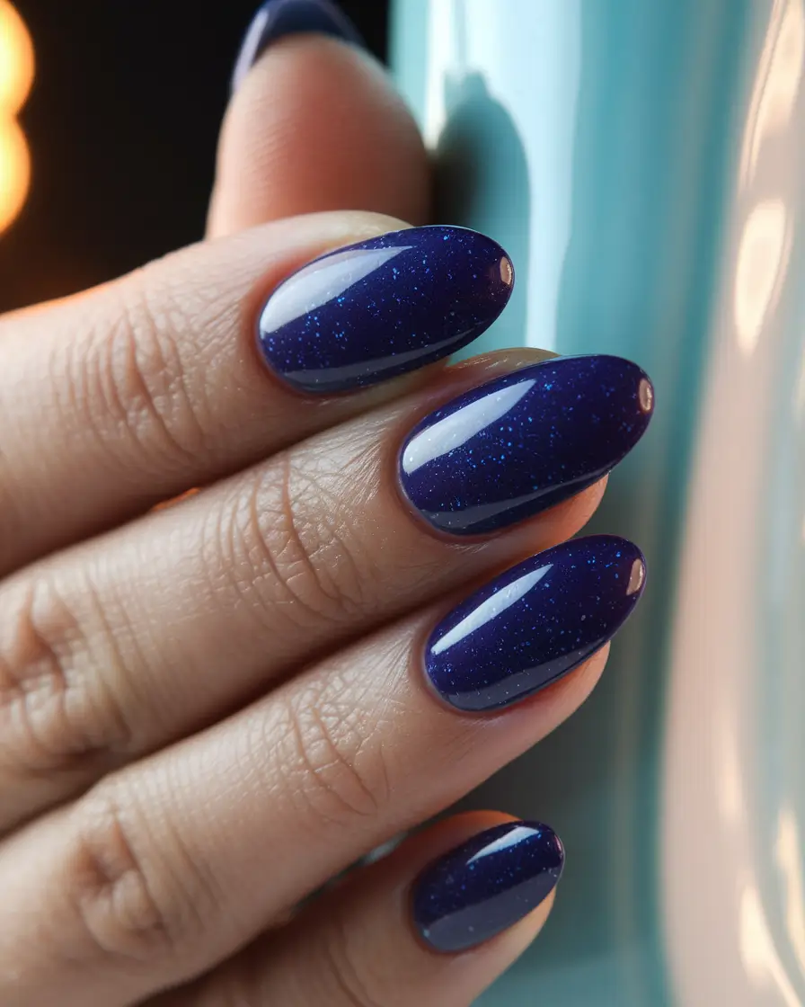 Fall 2025 Oval Shape Nails Cosmic Navy With Subtle Sparkle