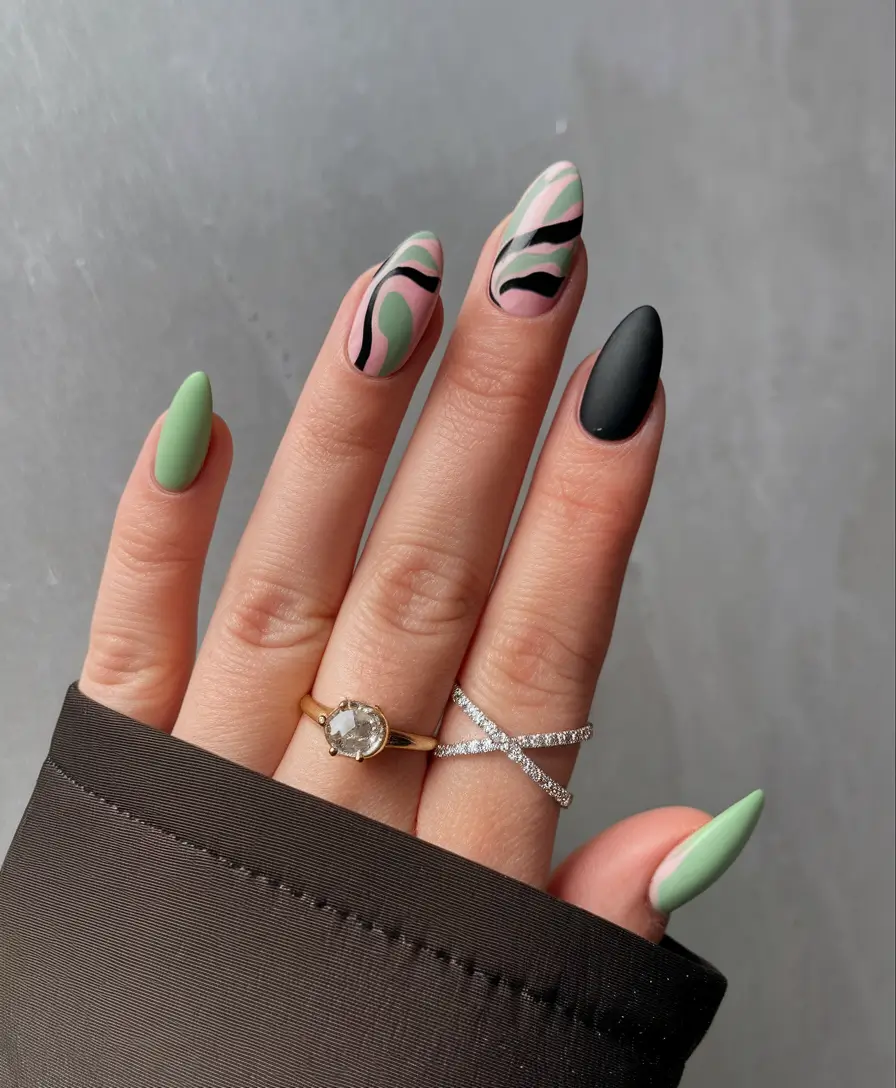 nail trends for fall 2025 Pastel Green and Zebra Abstract Almond Nails