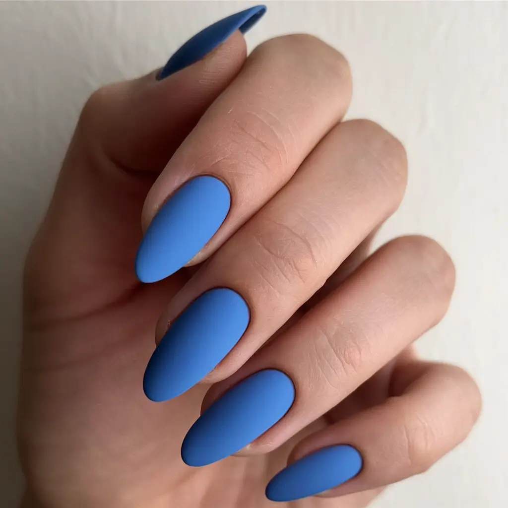 nail trends for fall 2025 Royal Blue Matte Almond Nails