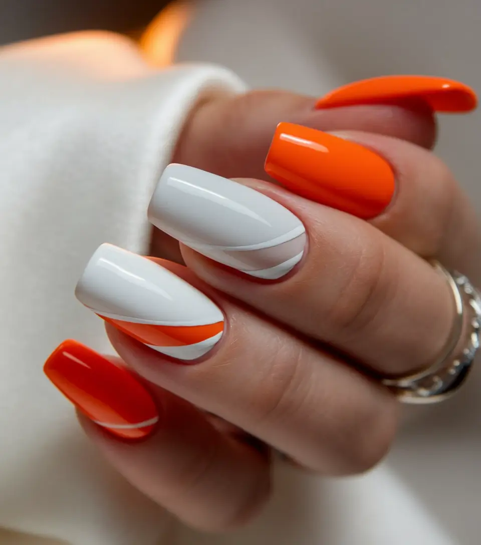 nail trends for fall 2025 Orange and White Graphic Square Nails