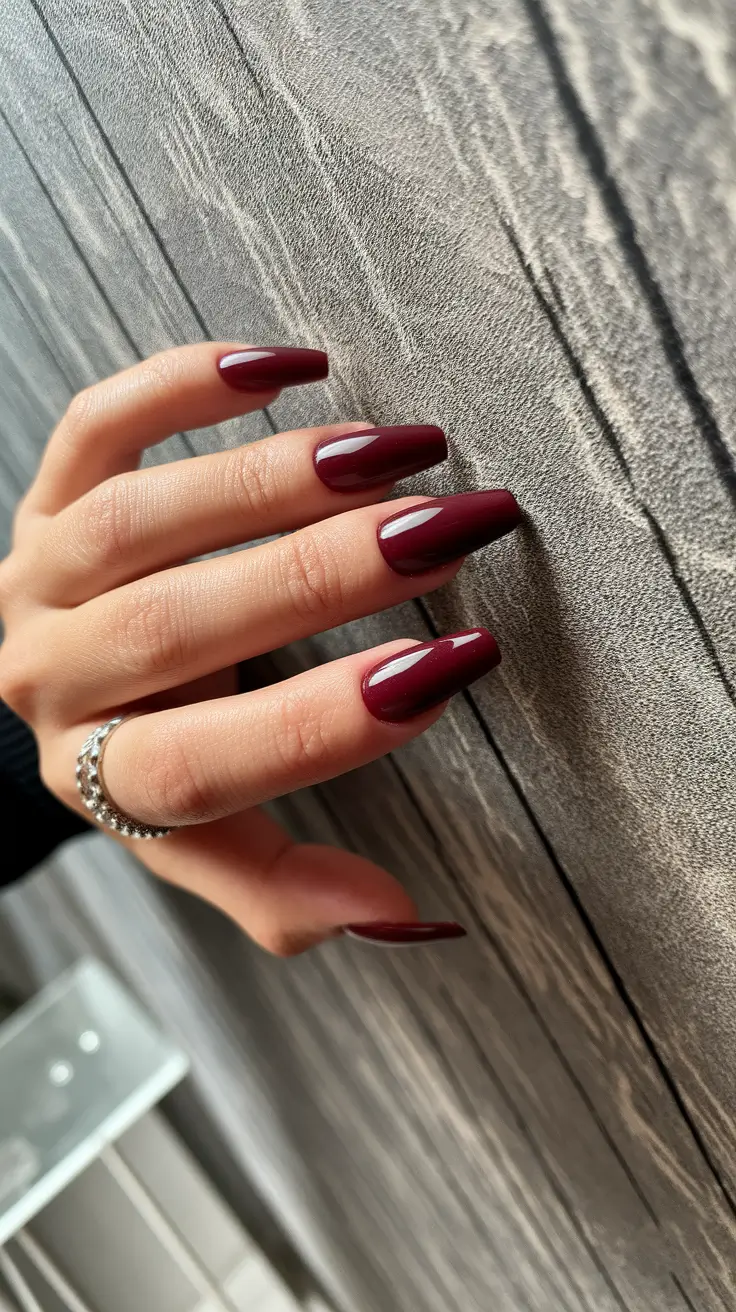 Short and Long Fall Acrylic Nails Ideas 2025 Classic Burgundy Gloss on Long Coffin Tips