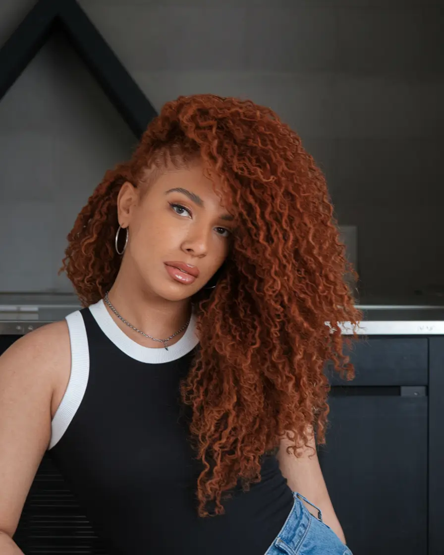 Modern Winter Haircuts Guide 2025-2026 Voluminous Curly Side Sweep