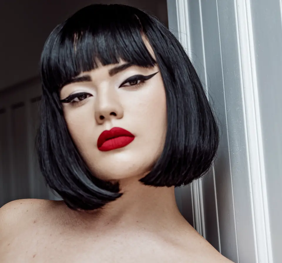 Stylish Short Winter Haircut Ideas 2025-2026 Sharp Jet-Black Bob with Drama