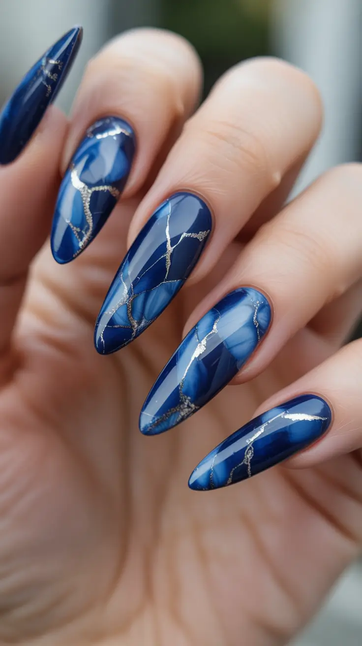 Cute Simple Nail Ideas for Christmas 2025 Royal Blue Marble Magic