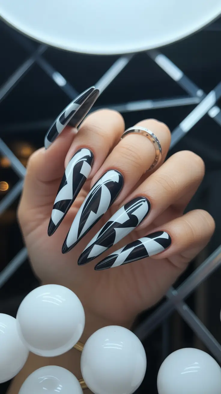 Trendy Black Nail Ideas for Christmas 2025 Monochrome Stiletto Drama