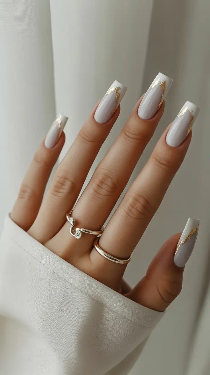 Winter Nail Colors and Designs Ideas 2025-2026 White Marble with Golden Veins