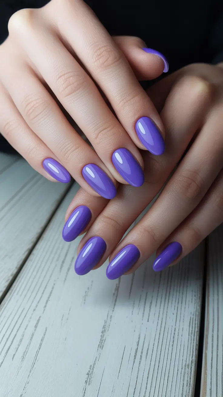 acrylic nail designs 2026 Classic Glossy Purple Almond Nails