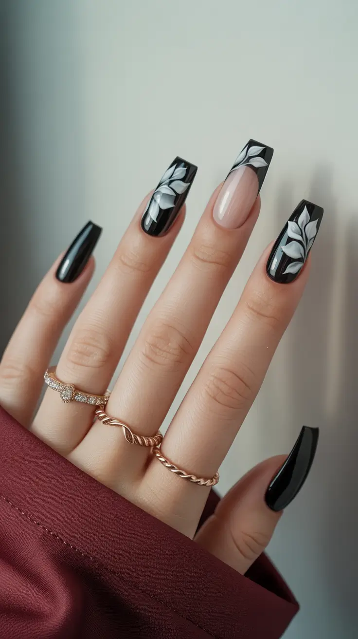 coffin nails ideas 2026 Black Botanical Art With Glossy Depth
