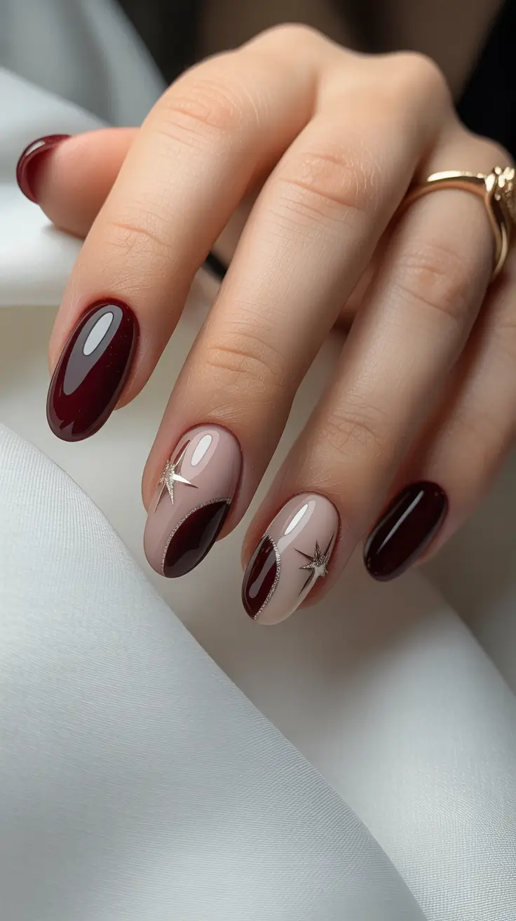 creative nail designs 2026 Burgundy Lunar Accents With Celestial Highlights