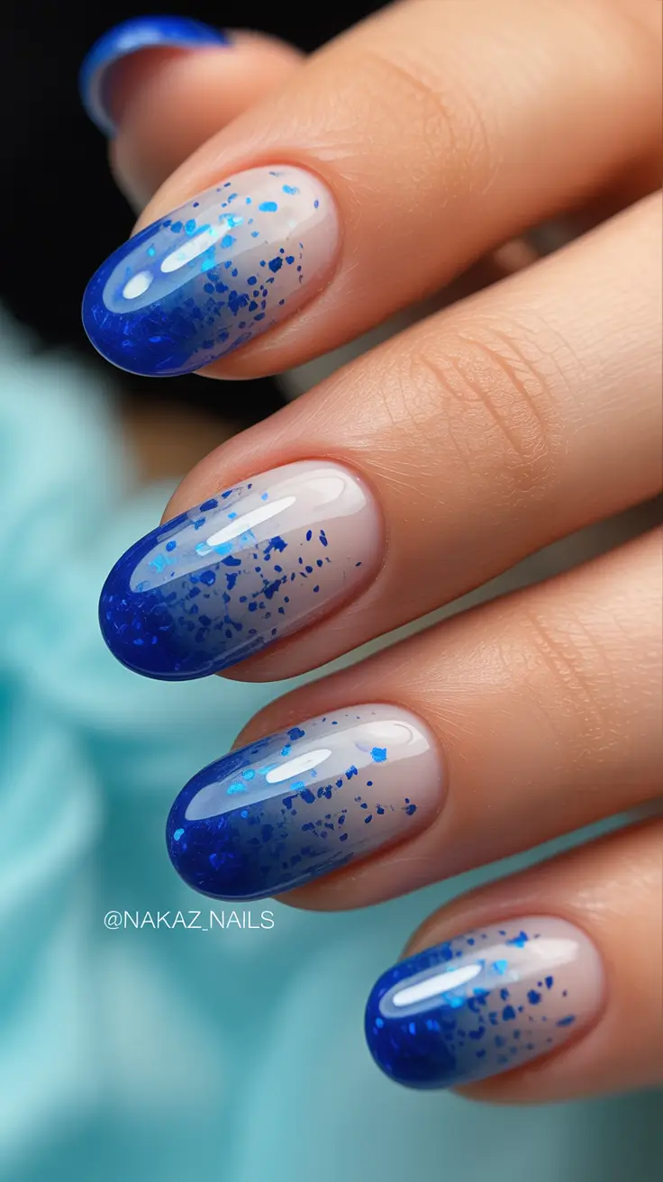 creative nail designs 2026 Blue Glitter Ombre With Sparkling Confetti