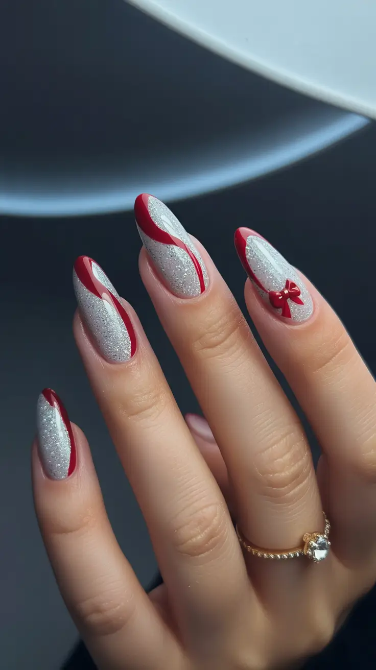 Elegant almond nails 2026 Silver Sparkle and Red Ribbons for Holiday Magic