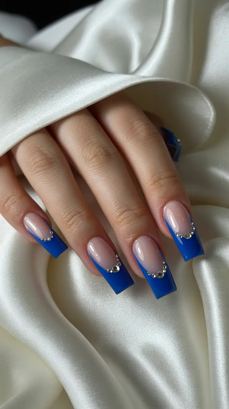 modern French nails 2026 Sapphire Luxe French With Crystals