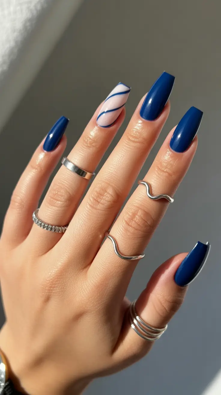 easy spring nails 2026 Navy Blue Gloss with Minimal Wave Accent