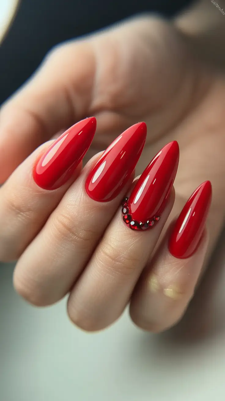 March Nails Color Ideas 2026 Classic Red Almond with Gems