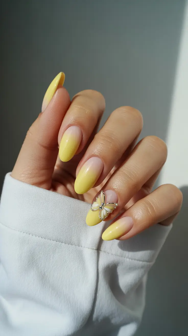 modern spring gel nails looks 2026 Butter Yellow Ombre with Delicate 3D Accent