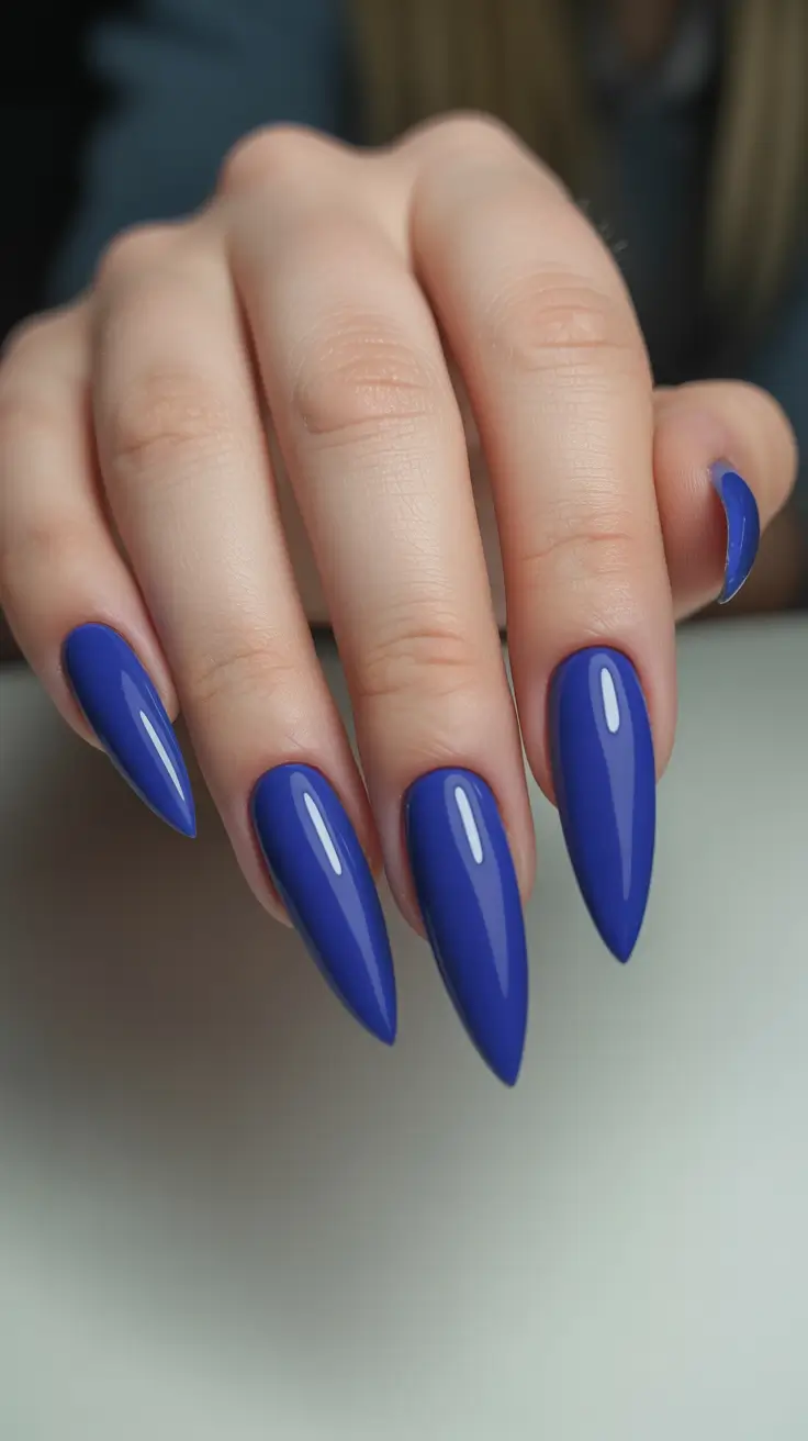 vibrant spring break nails 2026 Royal Blue Stiletto