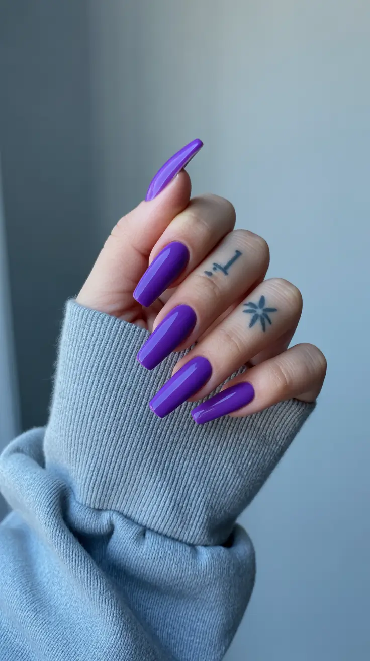 2026 summer nail colors ideas Glossy Violet Coffin Nails for Soft Statement Drama