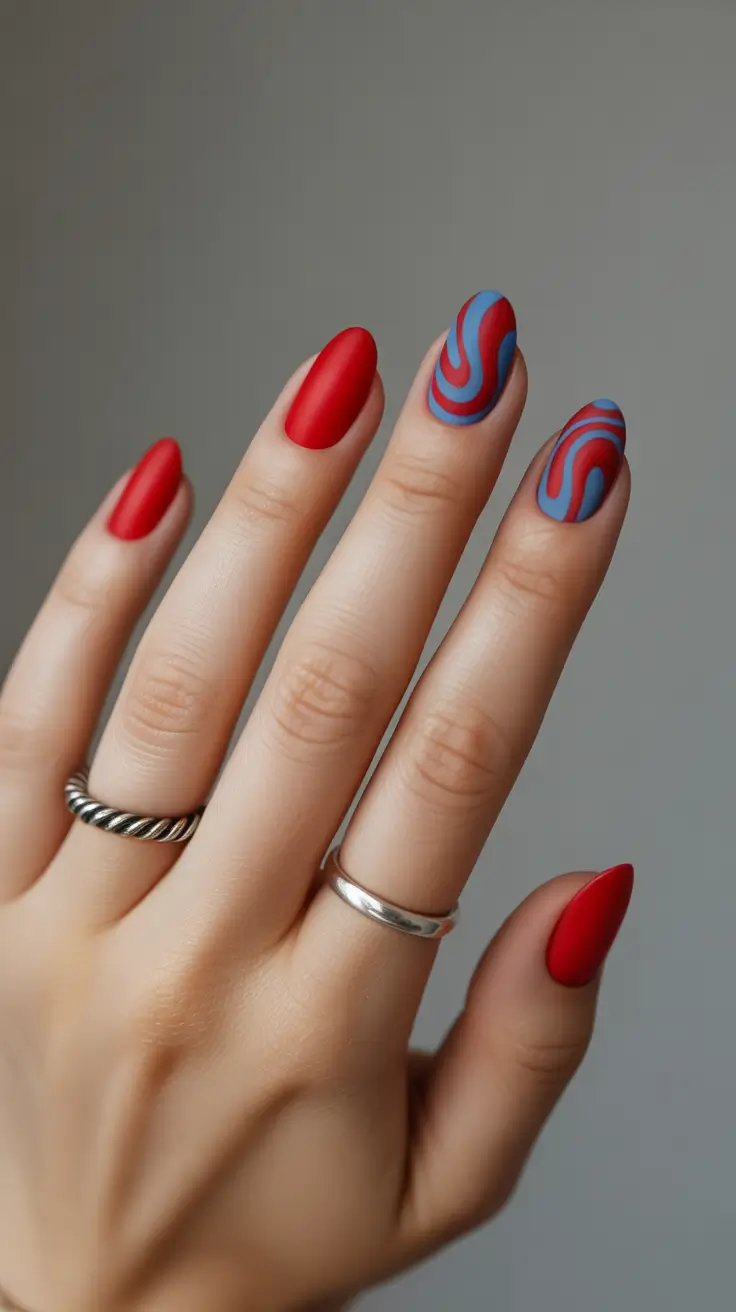 2026 summer nail colors ideas Retro Red and Blue Swirl Almonds for a Colorful Art Moment