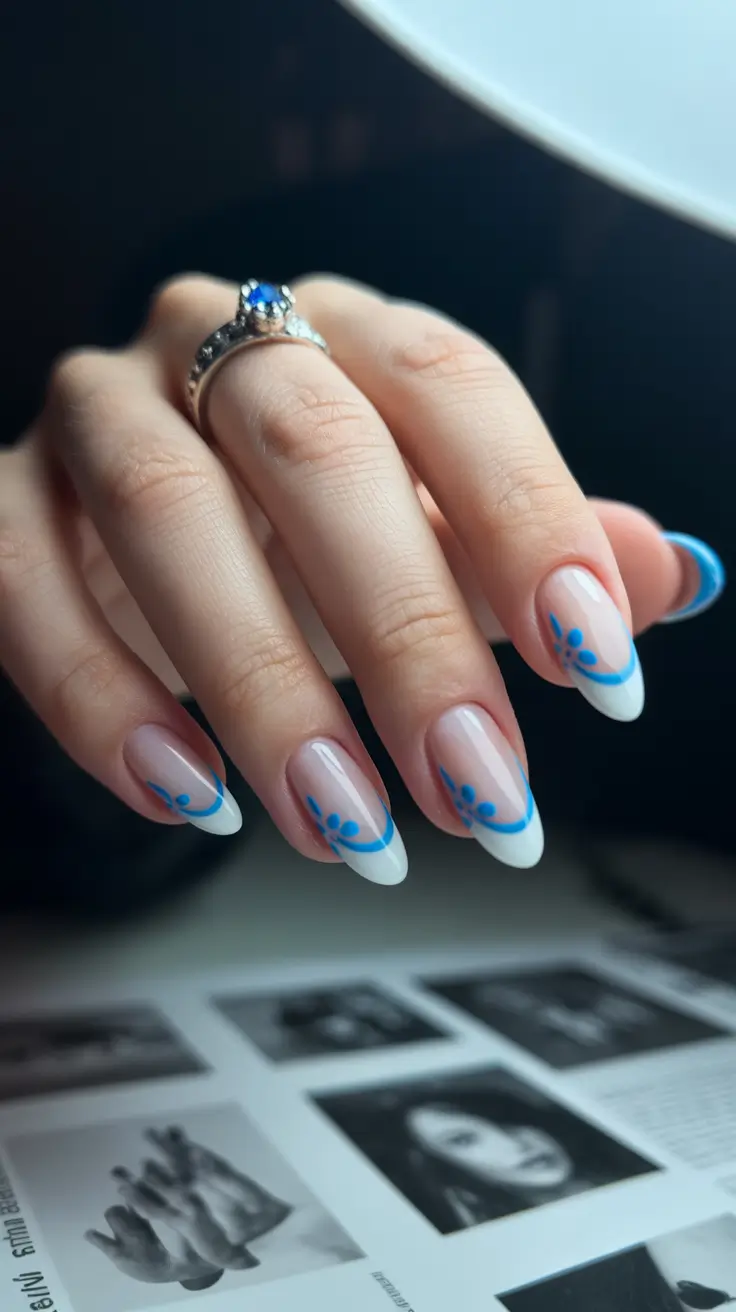 dreamy spring wedding nails 2026 Elegant Blue Floral French Tips for a Romantic Spring Ceremony