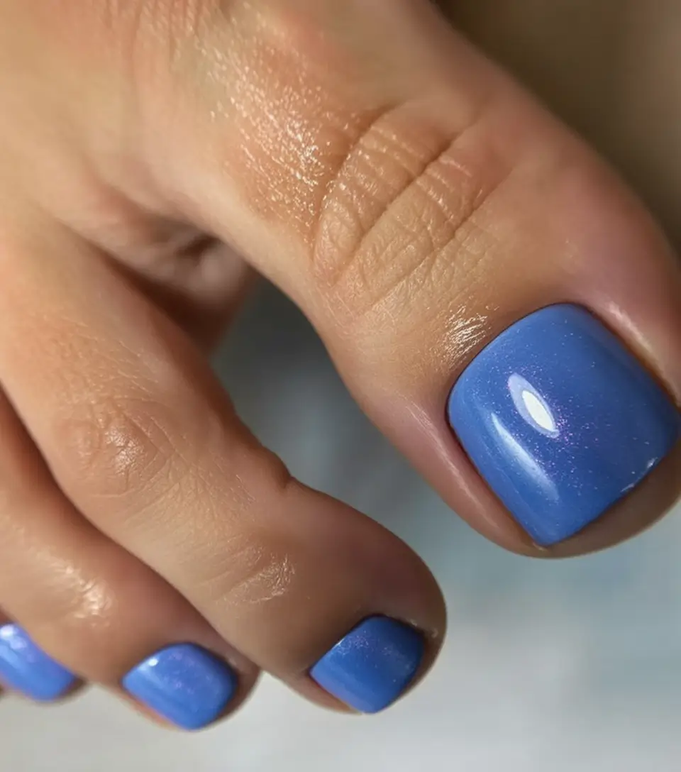 elegant spring toe nails 2026 Soft Shimmer Blue Pedicure That Captures Spring Light