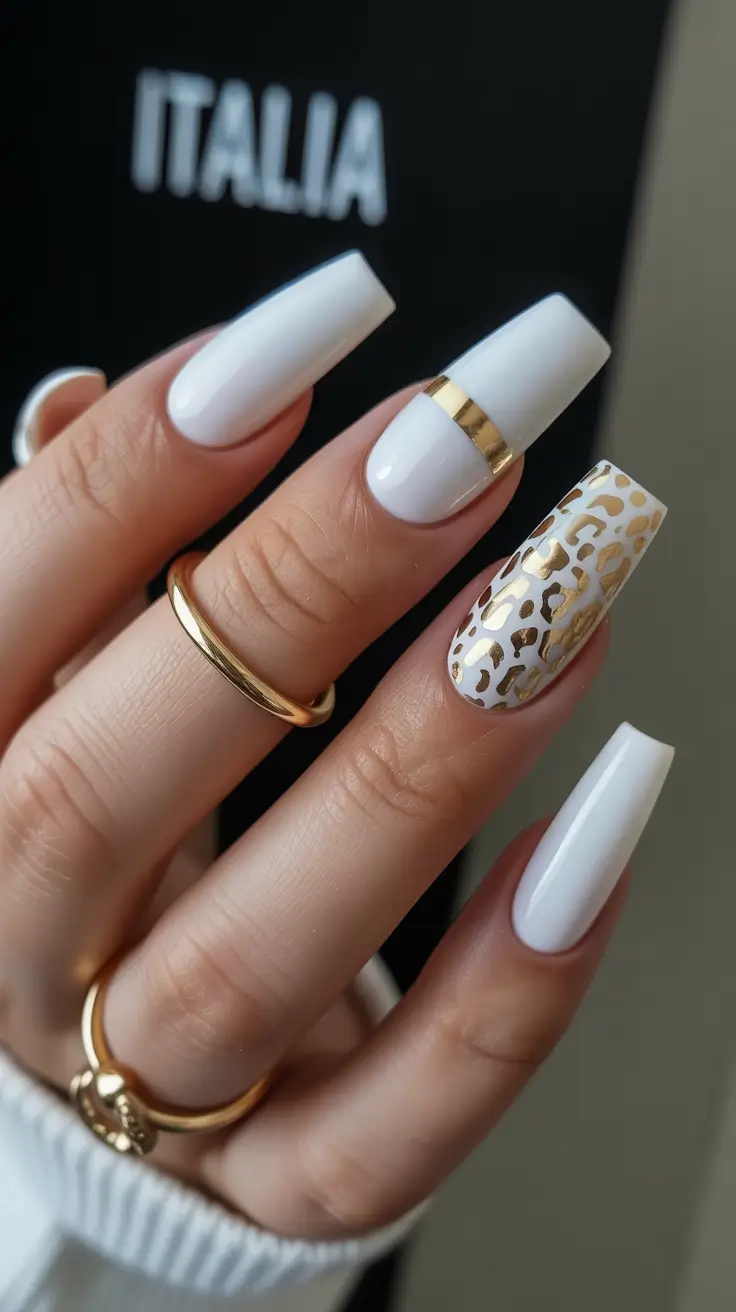 modern spring nails for tan skin 2026 Milky White Luxe with Gold Leopard Accent