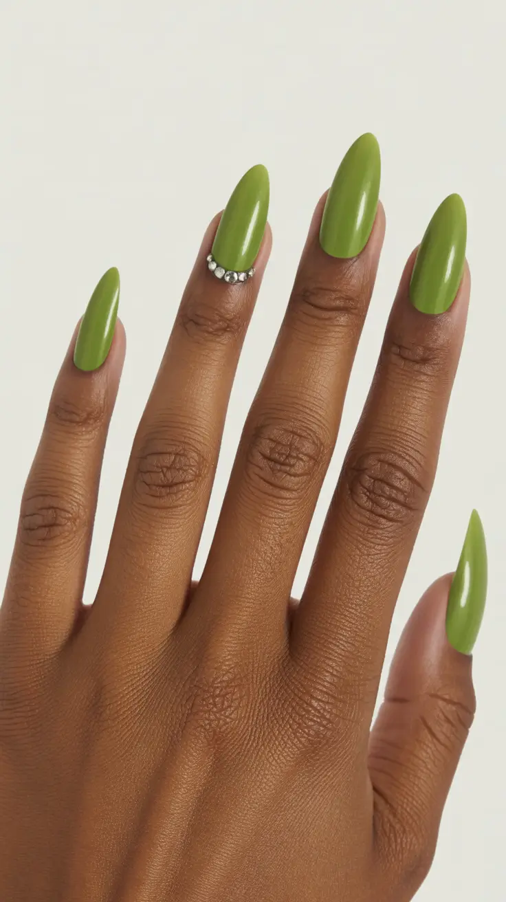 stylish spring nails for dark skin 2026 Olive Gloss Almond Nails That Feel Naturally Simple and Elevated