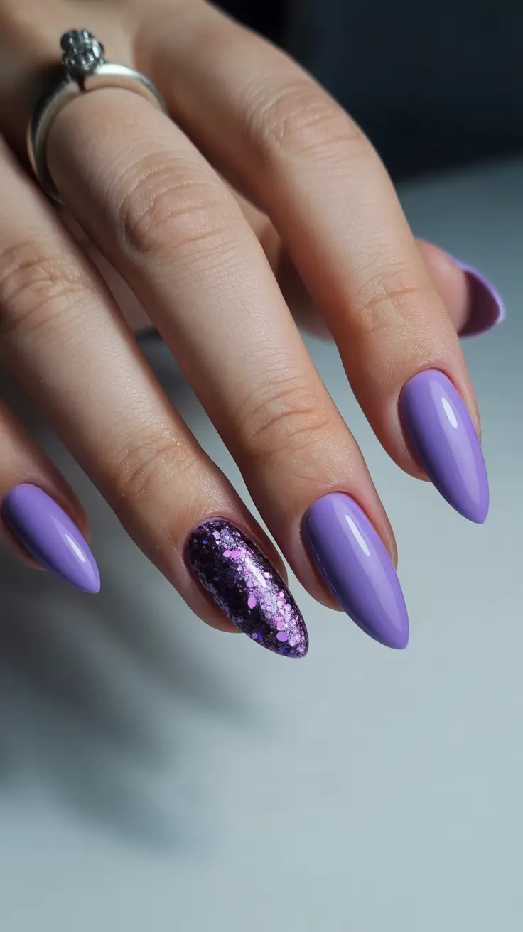 trendy spring almond nails 2026 Lavender Almond with Chunky Glitter Accent