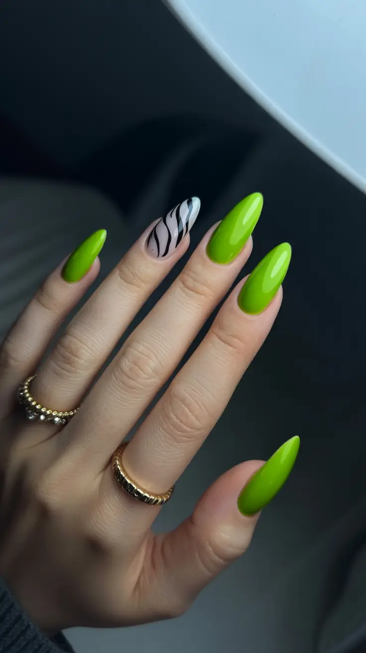trendy spring almond nails 2026 Electric Lime Almond with Graphic Zebra Accent