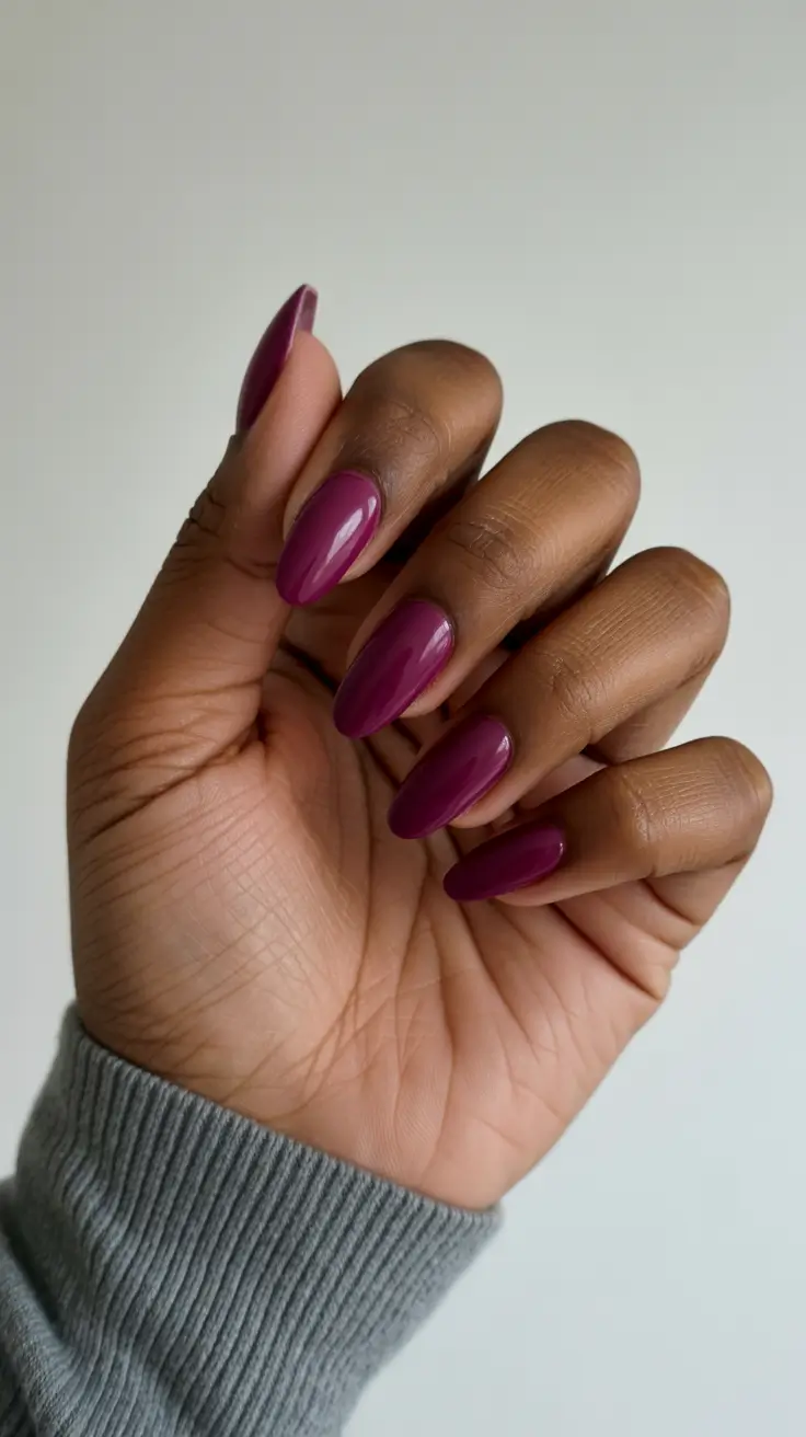 trendy spring nails for brown skin 2026 Glossy Berry Plum Almond Nails for Rich Spring Drama