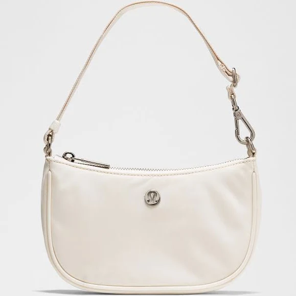 bag lululemon City Essentials Mini Shoulder Bag 1L - One Size - Light Ivory lululemon $58