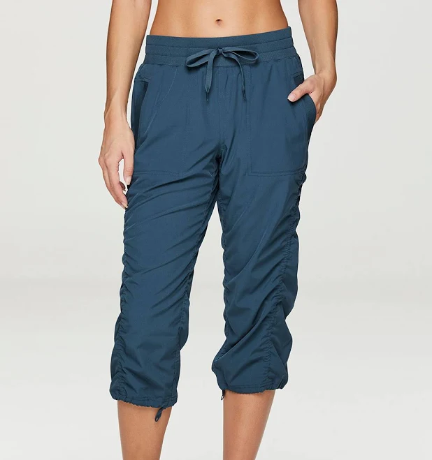 cropped active pants Rbx Active Women's Lightweight Woven Capri Pant with Pockets RBX Active $17.9